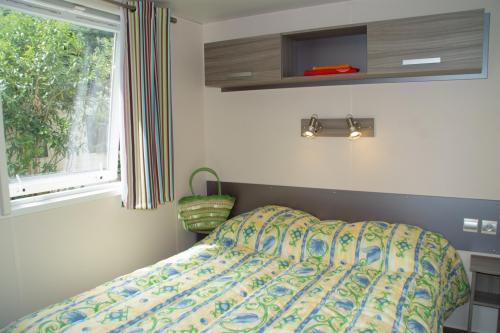 Grande chambre du mobil home